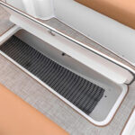 Underdeck storage for skis and wakeboards