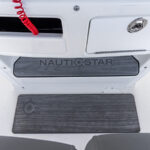 Built-in console footrests with anti-fatigue mats