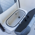 Forward console underseat baitwell / livewell