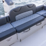 L model Offshore center consoles feature a built in full transom bench seat