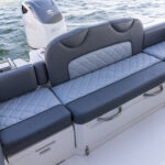 L model Offshore center consoles feature a built in full transom bench seat